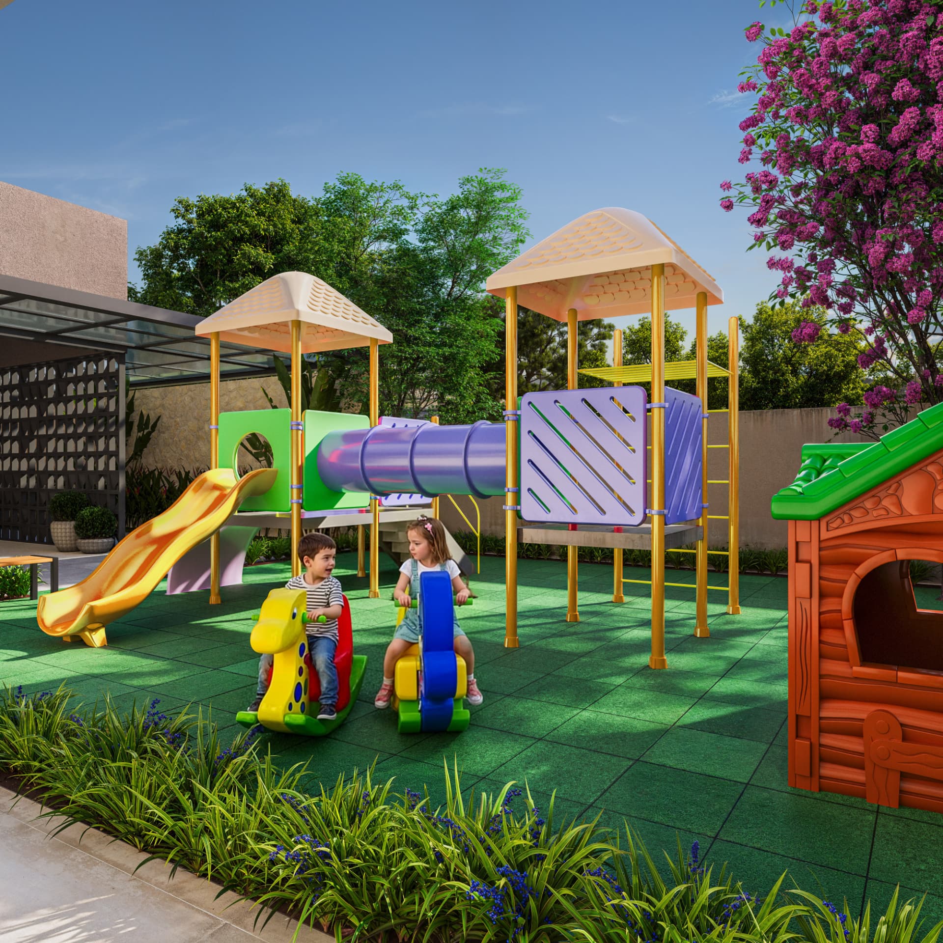 Playground do Sky Breeze com brinquedos coloridos, piso emborrachado e paisagismo florido